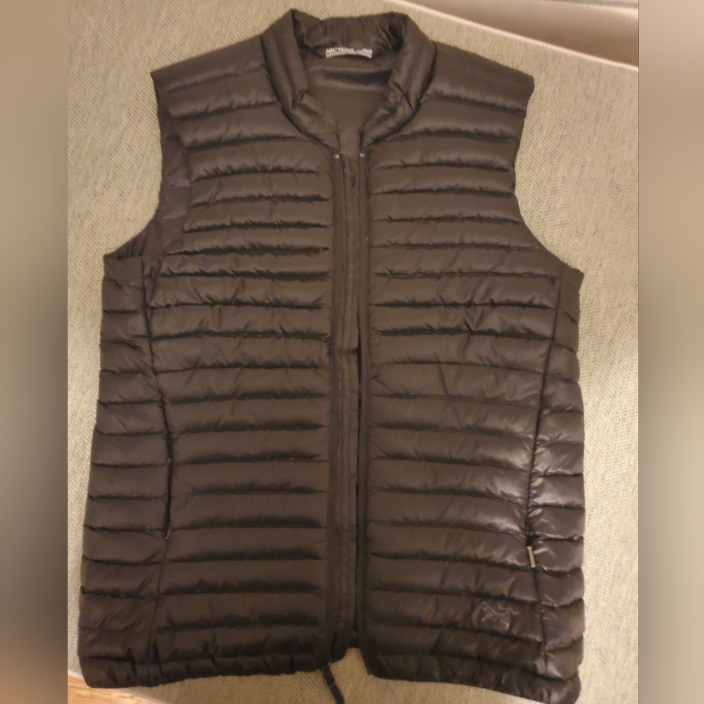 Black, light weight women's Arcteryx Nexis vest $300
